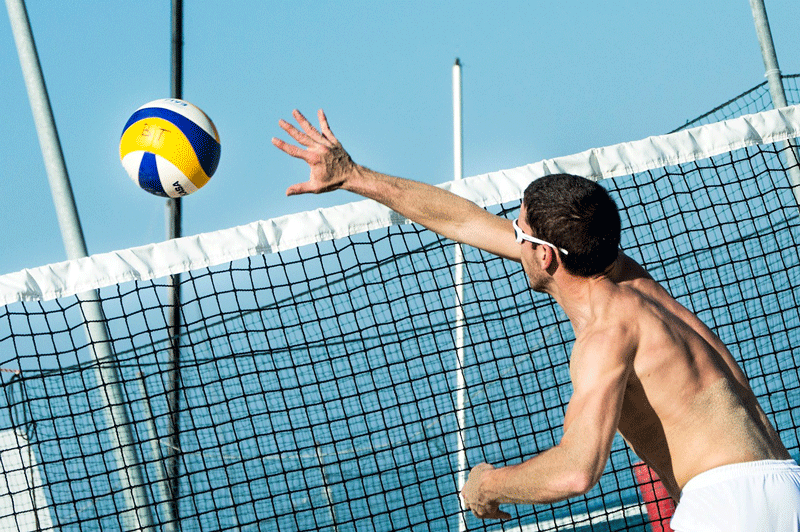 can you touch the net in beach volleyball